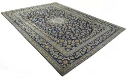 Close-up detail of 2000s Kashan rug from Iran / Persia showing Wool weave