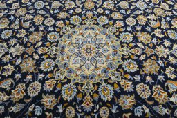 Central medallion detail of 2000s Kashan rug from Iran / Persia
