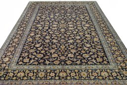 Surface texture of 2000s Kashan rug with natural Wool and intricate pattern