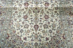 Close-up detail of 2000s Kashan rug from Iran / Persia showing Wool weave