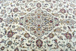 Central medallion detail of 2000s Kashan rug from Iran / Persia