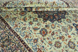 Close-up detail of 2000s Kashan rug from Iran / Persia showing Wool weave