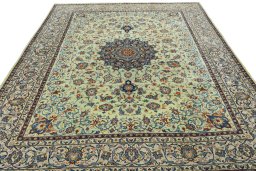 Surface texture of 2000s Kashan rug with natural Wool and intricate pattern