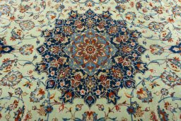 Central medallion detail of 2000s Kashan rug from Iran / Persia