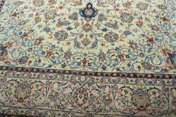 Close-up detail of 2000s Kashan rug from Iran / Persia showing Wool weave