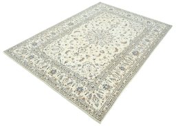 Corner detail of 2000s Kashan rug showing border pattern and Wool pile