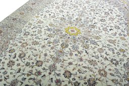 Backside of handmade 2000s Kashan rug showing knot structure and weave density