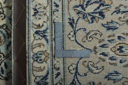Surface texture of 2000s Kashan rug with natural Wool and intricate pattern