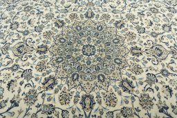 Central medallion detail of 2000s Kashan rug from Iran / Persia