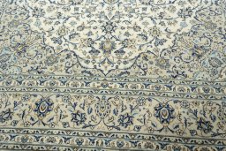 Close-up detail of 2000s Kashan rug from Iran / Persia showing Wool weave