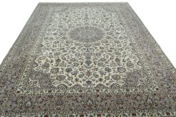 Surface texture of 2000s Kashan rug with natural Wool and intricate pattern