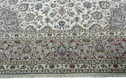 Full view of 2000s Kashan rug from Iran / Persia, 409 × 286 cm in Beige tones