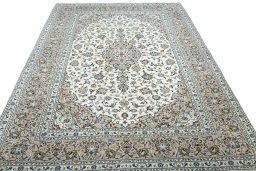 Surface texture of 2000s Kashan rug with natural Wool and intricate pattern