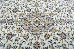 Central medallion detail of 2000s Kashan rug from Iran / Persia