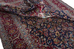 Surface texture of 2000s Kashan rug with natural Wool and intricate pattern