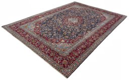 Corner detail of 2000s Kashan rug showing border pattern and Wool pile