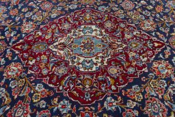 Central medallion detail of 2000s Kashan rug from Iran / Persia