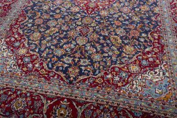 Close-up detail of 2000s Kashan rug from Iran / Persia showing Wool weave