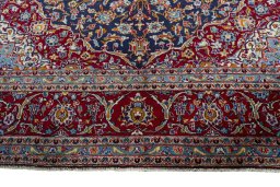 Full view of 2000s Kashan rug from Iran / Persia, 415 × 292 cm in Blue tones