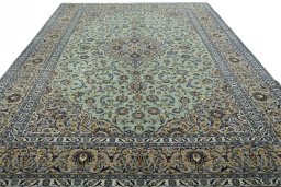 Surface texture of 2000s Kashan rug with natural Wool and intricate pattern