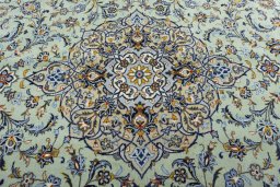 Central medallion detail of 2000s Kashan rug from Iran / Persia