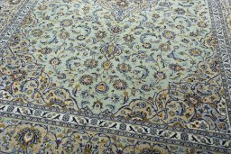 Close-up detail of 2000s Kashan rug from Iran / Persia showing Wool weave