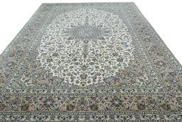 Surface texture of 2000s Kashan rug with natural Wool and intricate pattern