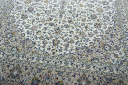 Close-up detail of 2000s Kashan rug from Iran / Persia showing Wool weave
