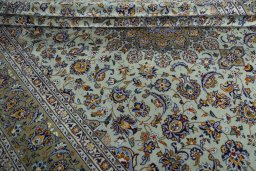 Close-up detail of 2000s Kashan rug from Iran / Persia showing Wool weave