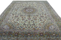 Surface texture of 2000s Kashan rug with natural Wool and intricate pattern