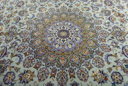 Central medallion detail of 2000s Kashan rug from Iran / Persia