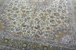 Close-up detail of 2000s Kashan rug from Iran / Persia showing Wool weave