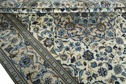Close-up detail of 2000s Kashan rug from Iran / Persia showing Wool weave