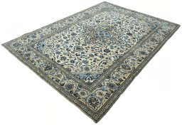 Corner detail of 2000s Kashan rug showing border pattern and Wool pile