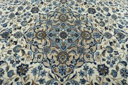 Central medallion detail of 2000s Kashan rug from Iran / Persia