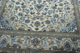 Close-up detail of 2000s Kashan rug from Iran / Persia showing Wool weave