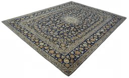 Corner detail of 2000s Kashan rug showing border pattern and Wool pile