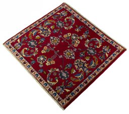 Corner detail of 2000s Kashan rug showing border pattern and Wool pile