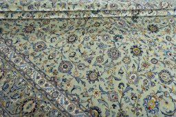 Close-up detail of 2000s Kashan rug from Iran / Persia showing Wool weave