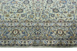 Full view of 2000s Kashan rug from Iran / Persia, 391 × 297 cm in Green tones