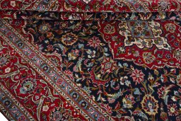 Close-up detail of 2000s Kashan rug from Iran / Persia showing Wool weave