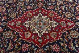 Central medallion detail of 2000s Kashan rug from Iran / Persia