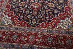 Close-up detail of 2000s Kashan rug from Iran / Persia showing Wool weave