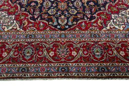 Full view of 2000s Kashan rug from Iran / Persia, 355 × 242 cm in Blue tones