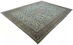 Corner detail of 2000s Kashan rug showing border pattern and Wool pile
