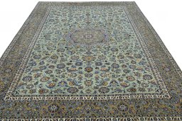 Surface texture of 2000s Kashan rug with natural Wool and intricate pattern