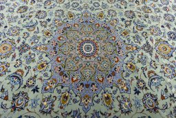 Central medallion detail of 2000s Kashan rug from Iran / Persia