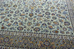 Close-up detail of 2000s Kashan rug from Iran / Persia showing Wool weave