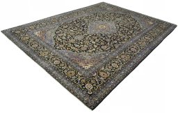 Corner detail of 2000s Kashan rug showing border pattern and Wool pile