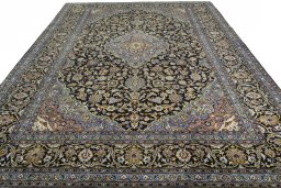 Surface texture of 2000s Kashan rug with natural Wool and intricate pattern